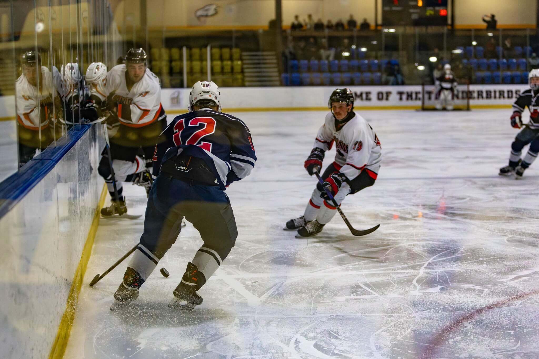 Team Canada Deaf Hockey players in action during game at UBC Thunderbird Arena